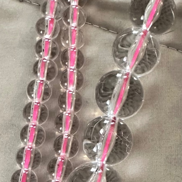 Graduating clear glass bead necklace strung on hot pink string. Lobster clasp - Picture 13 of 13